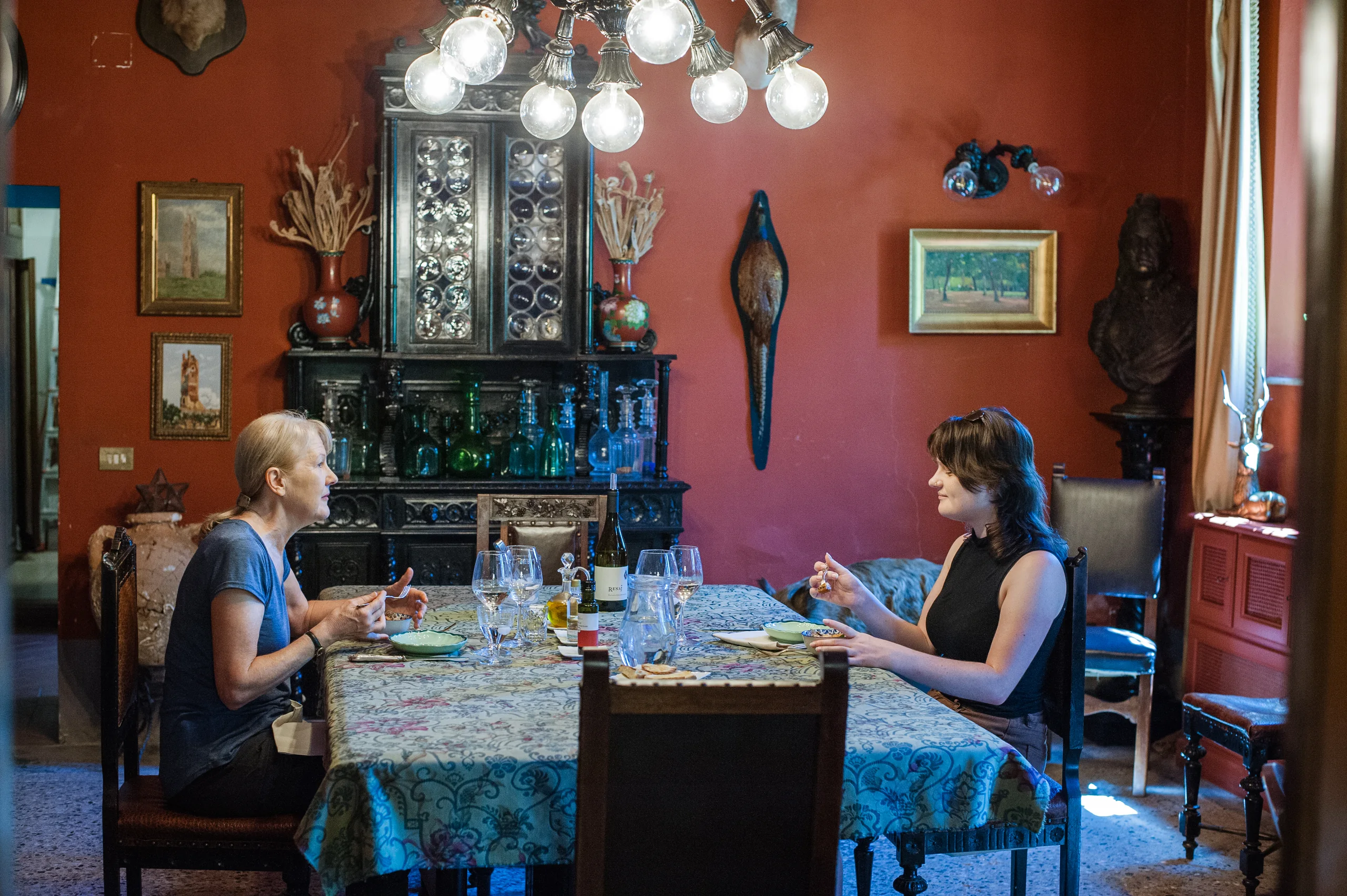 Guests dining in the historic villa sala